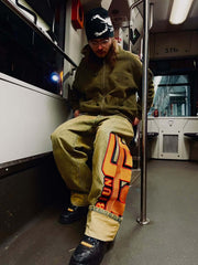 Rabiun customer on a bus in the selvedge jeans and a Rabiun hat