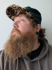 Parker in our double brimmed painters hat in Leopard